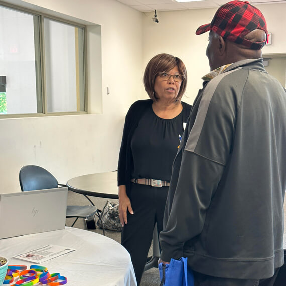 vendor and attendee at job fair event