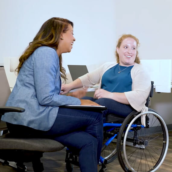 two people by a table together