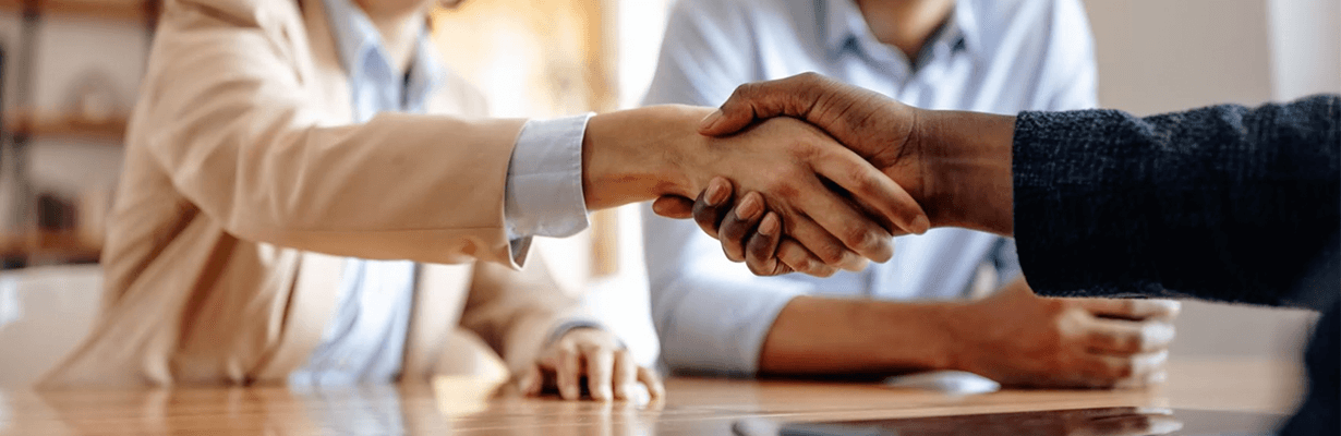 Two people shaking hands