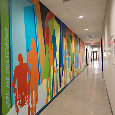 Mural unveiled at new GESMN Career & Services Campus