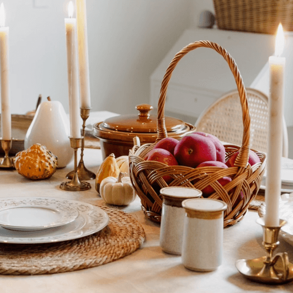 A fall dinning table with plate settings