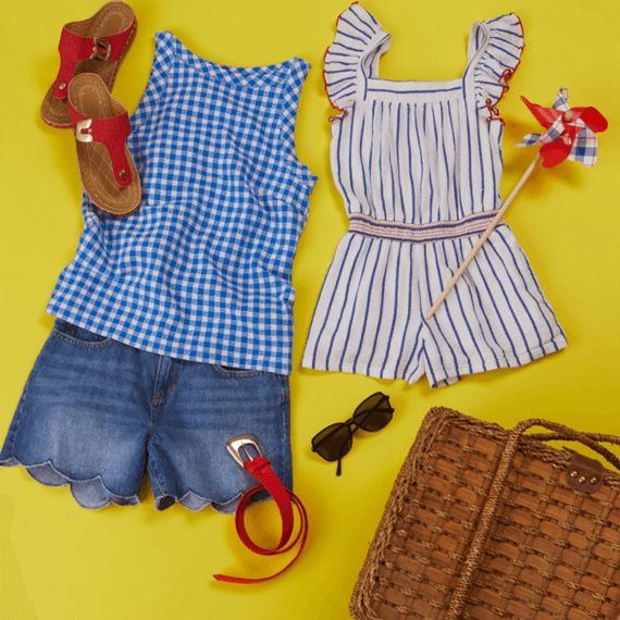 A tank top, shorts, sandals, a belt, sunglasses, a picnic basket, a romper and a pinwheel. 